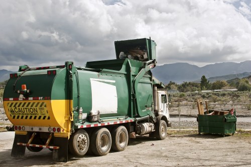 Construction workers segregating waste materials